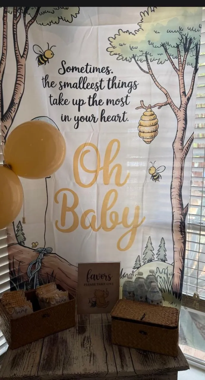 Woodland Oh Baby backdrop with favor boxes and woven baskets