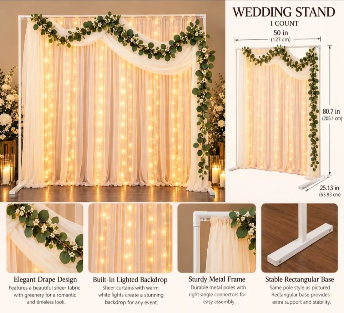 White wedding stand with sheer curtains, warm string lights and a greenery garland